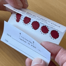 Fold the top flap of the blotting paper into the bottom part.