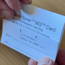 Then place the blotting paper into the "blue" bag, seal it, and place everything into the return envelope.
